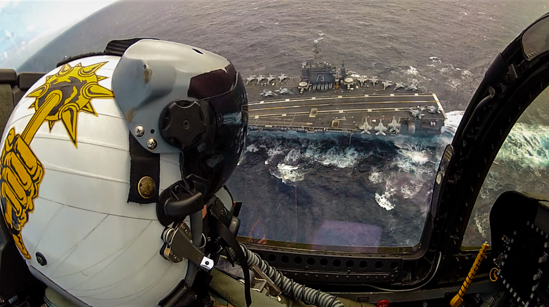 Illustration for article titled Spectacular photos taken by an F-18 weapons trainer officer